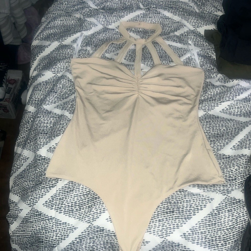 Tan body suit